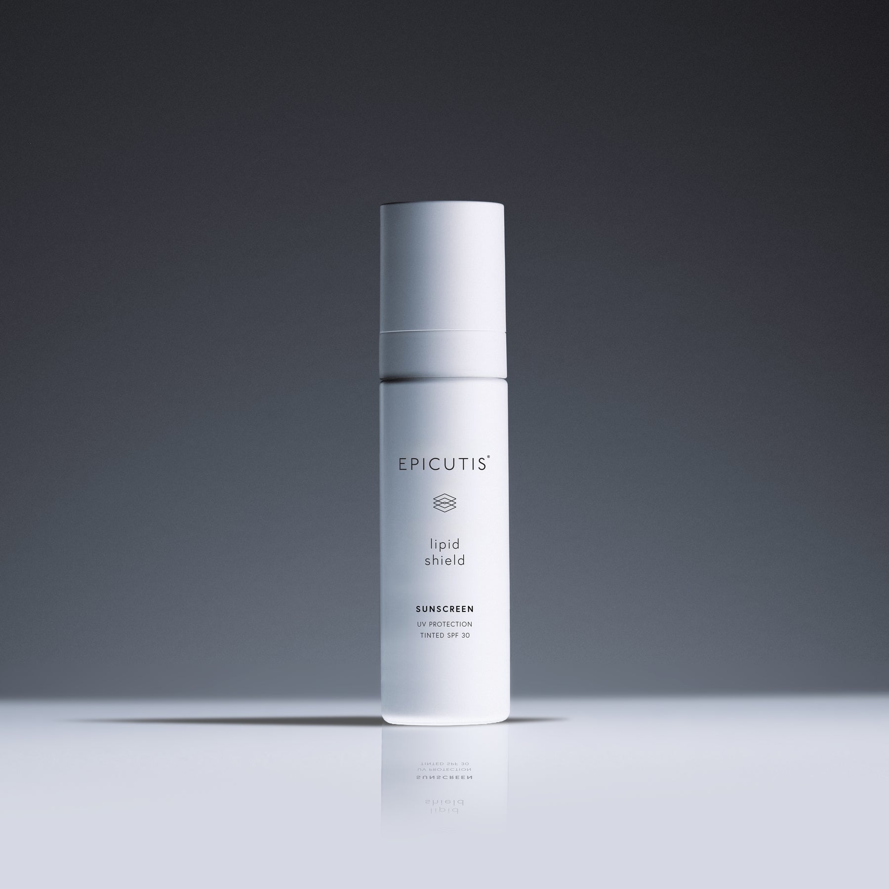 Epicutis liquid shield sunscreen bottle on a gray background